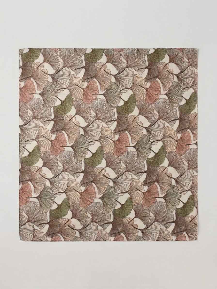Autumn Gingko Scarf opened out to show a gingko leaf print in warm autumn hues.