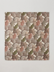 Autumn Gingko Scarf opened out to show a gingko leaf print in warm autumn hues.